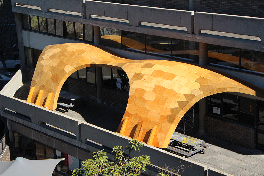 Large - Wurth Machinery Yellow canopy over outdoor seating area